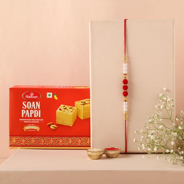 Send Sneh Red White Pearl Rakhi Soan Papdi Online RKH22 106507