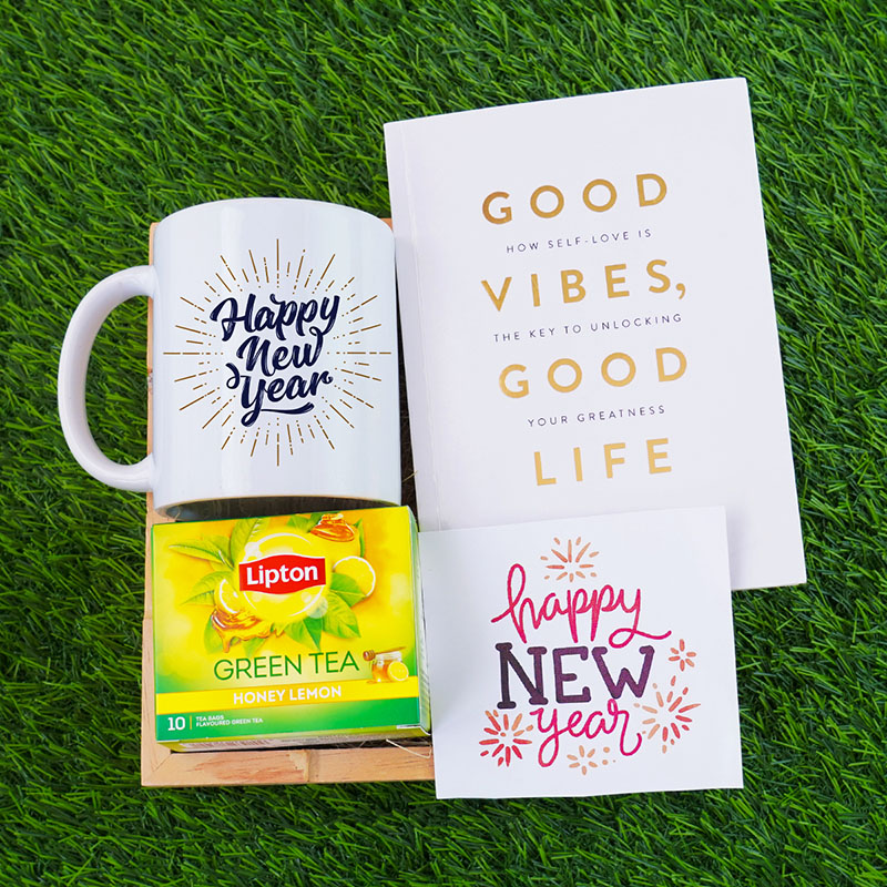 Send Book with Green Tea Gift Hamper for New Year Online GAL22109880
