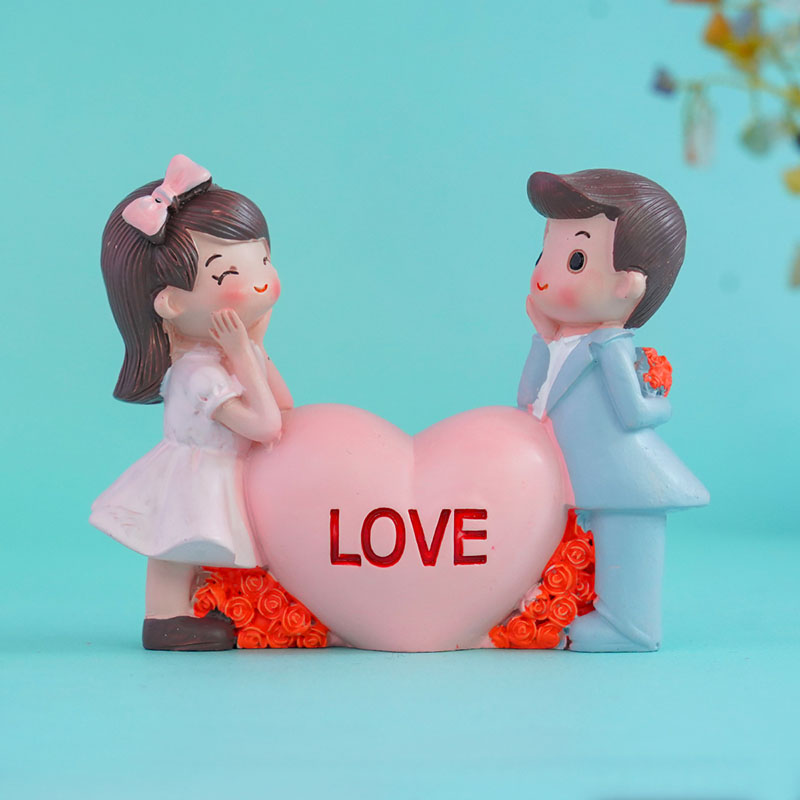 Send Chocolates with Love Couple Showpiece Combo for Kiss Day Online