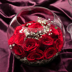 15 Red Roses in a Round Glass Vase