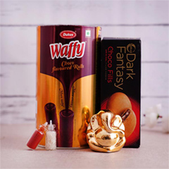 Lord Ganesha Idol with Choco Roll and Cookies