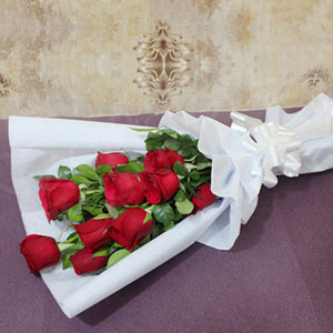 10 Red Roses in Paper Wrapping