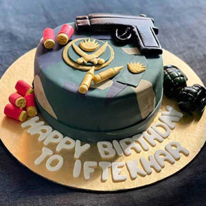 Army Themed Cake With Pistol On Top