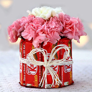 Carnation Flowers with Chocolates in Vase