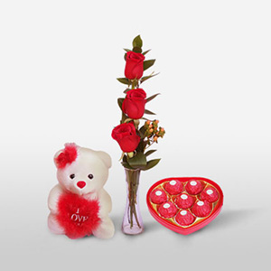 Red Roses in Vase with Chocolates N Teddy 