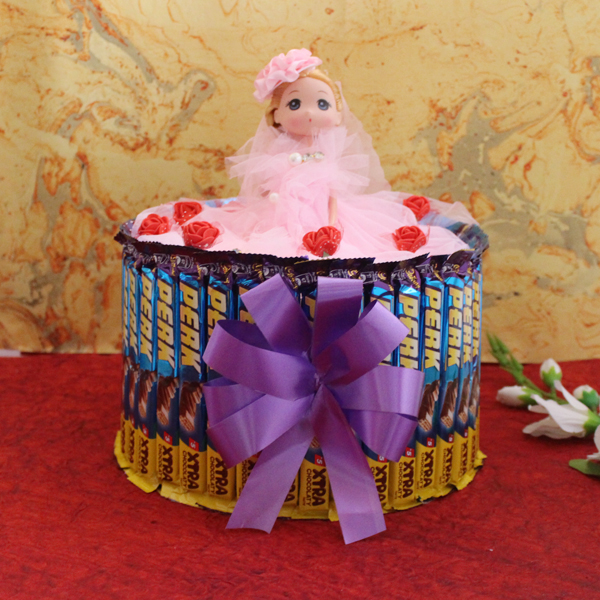 Send Doll and Chocolate Cake Style Arrangement Online