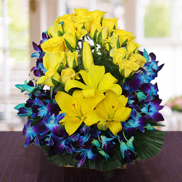 Send Yellow Flowers with Blue Orchids Basket Online
