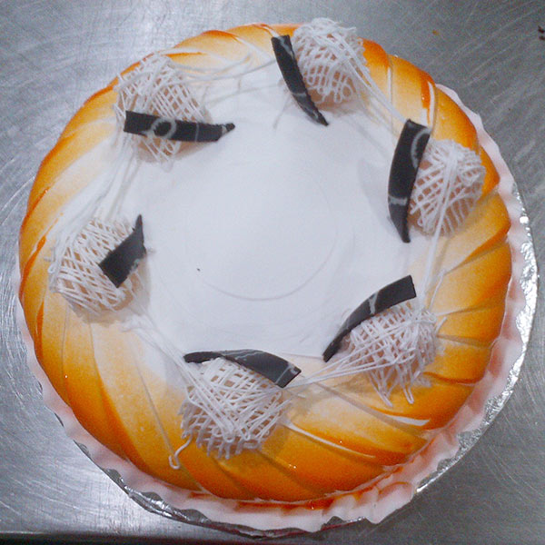Send 1/2 kg  Orange Cake  Online