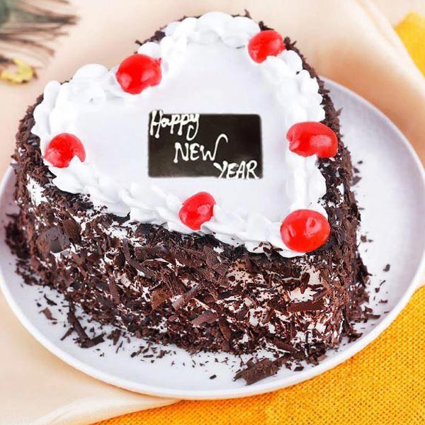 Send Delighting Heart Shape Black Forest New Year Cake Online