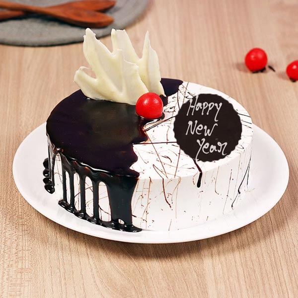 Send Luscious Choco Vanilla New Year Cake Online
