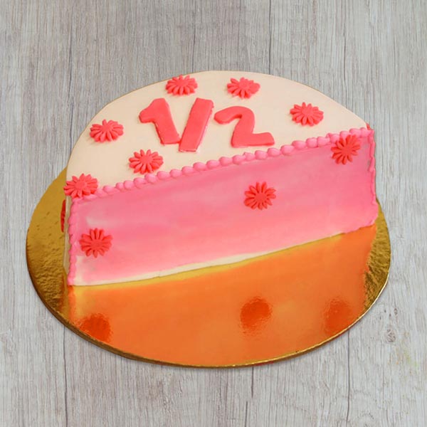 Send semi-round-pink-floral-cake Online