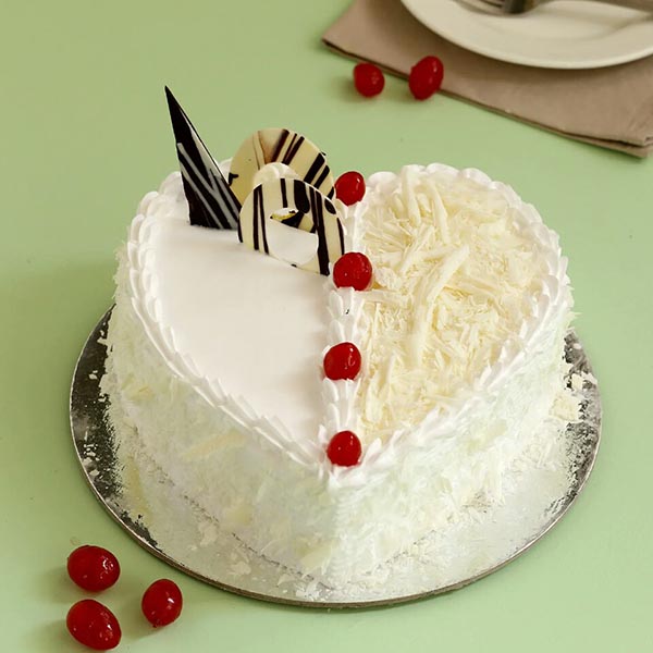 Send Vanilla Cake in Heart Shape with Cherry Topping Online